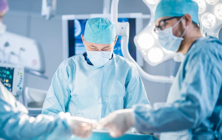 doctors performing craniotomy